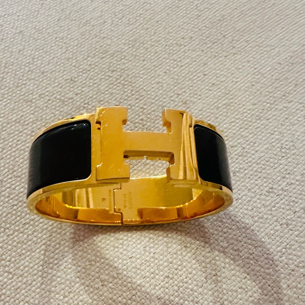 Hermes H black with gold bracelet